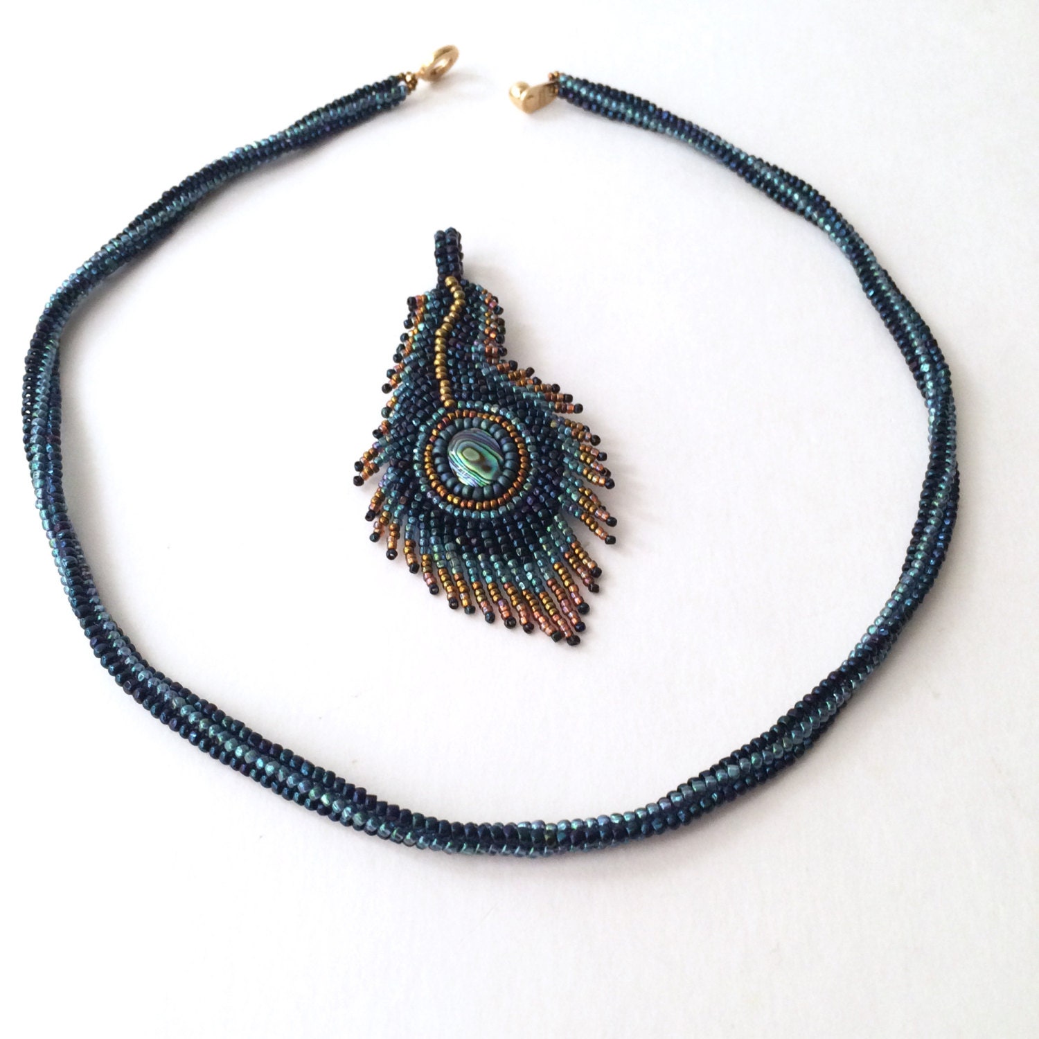 Peacock feather bead embroidery necklace with paua cabochon