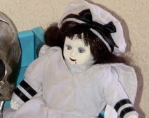 sailor haunted doll