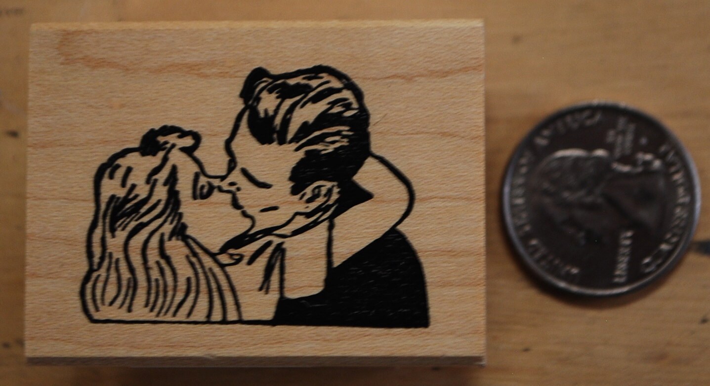 Kissing couple rubber stamp