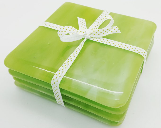 Lime green streaky fused glass handmade coaster set. Handcrafted giftware. house and home giftware. Wedding, birthday housewarming gifts