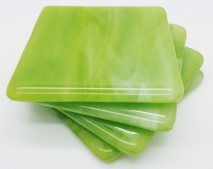 Lime green streaky fused glass handmade coaster set. Handcrafted giftware. house and home giftware. Wedding, birthday housewarming gifts