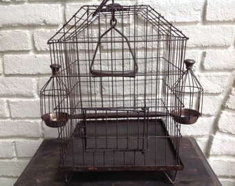 Vintage reproduction old metal birdcage