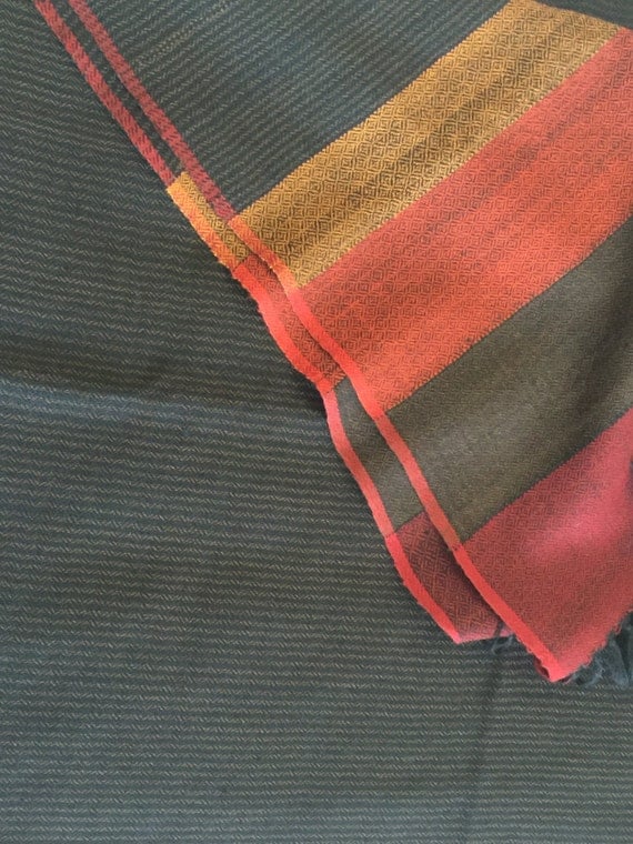 Pure wool scarf stole shawl in rich vibrant colors Black with narrow striped pattern bordered with broad splash of red and yellow