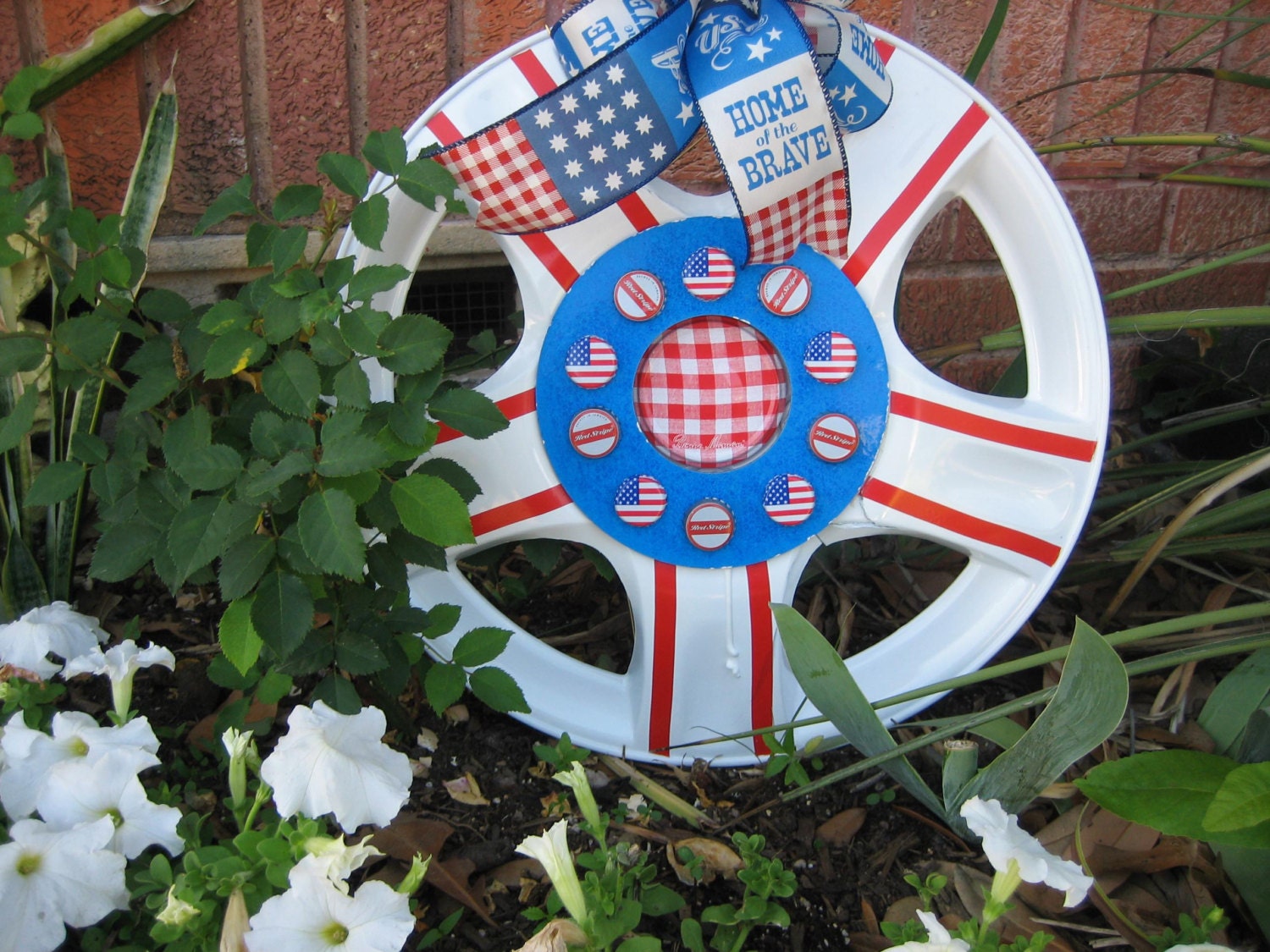 Hubcap yard art or Door decoration