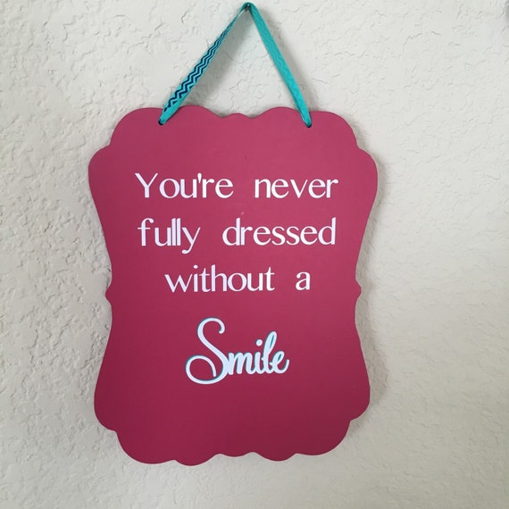 You&#39;re never fully dressed without a smile. Chalkboard