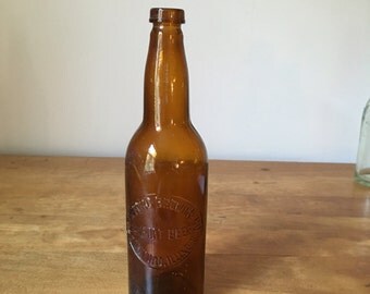 Vintage pre-prohibition brown glass beer bottle from Rockford Brewing company 1900-1920 era