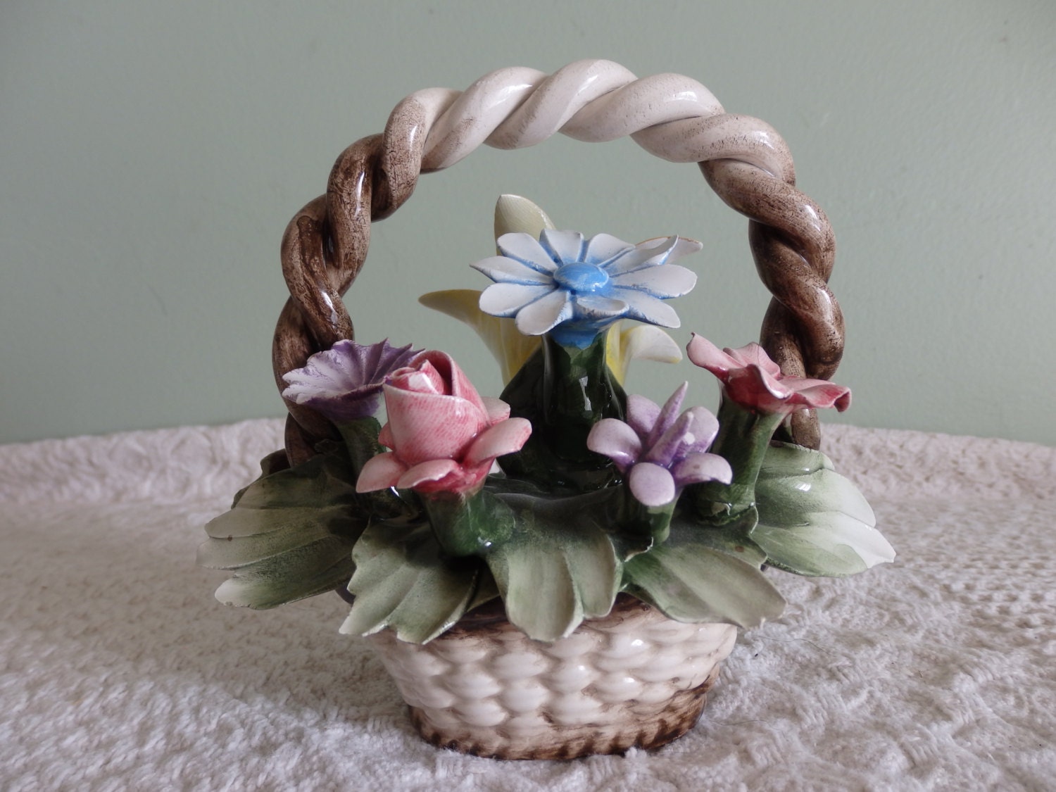 Vintage Capodimonte porcelain basket with various colorful