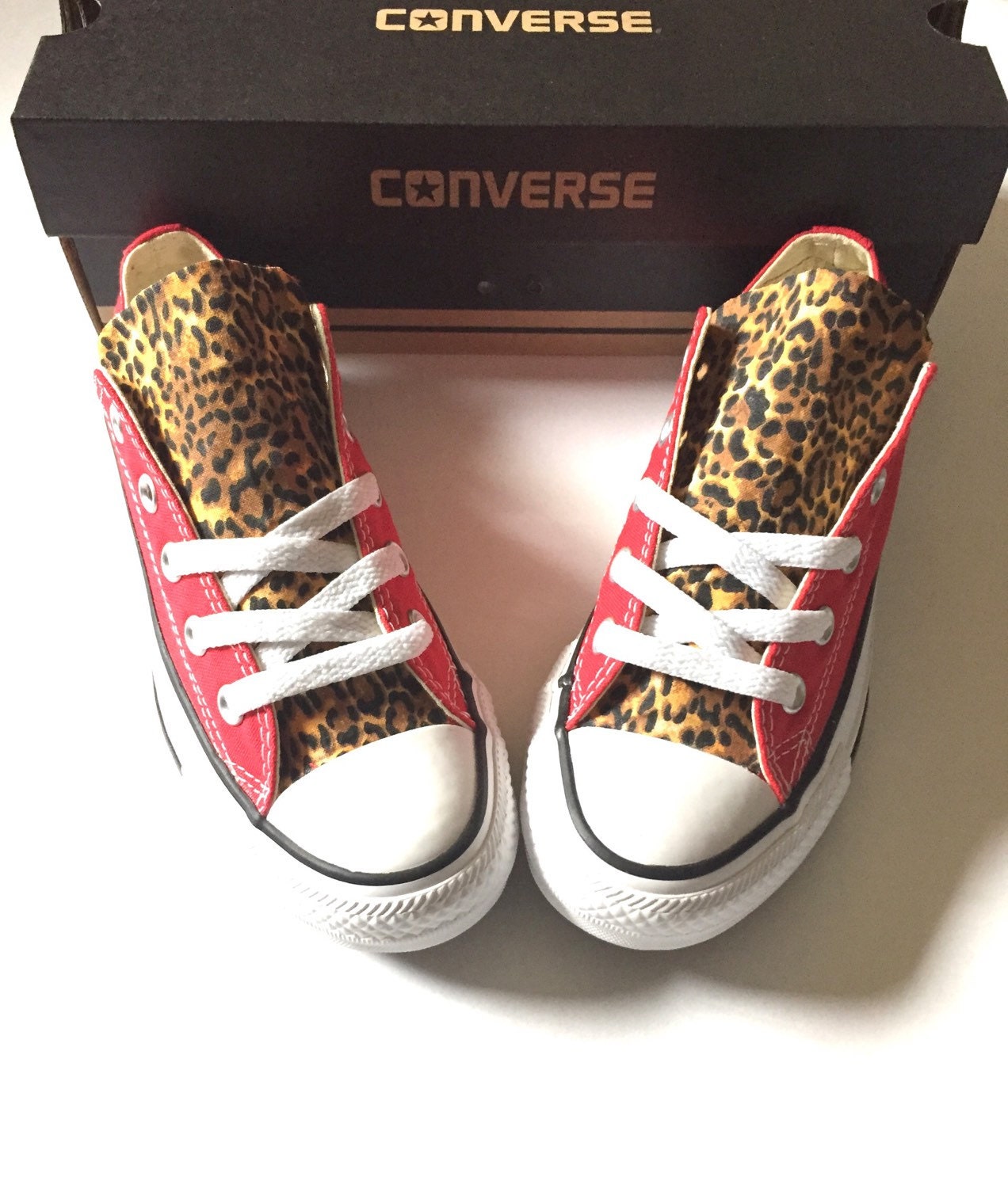 cheetah print high top platform converse