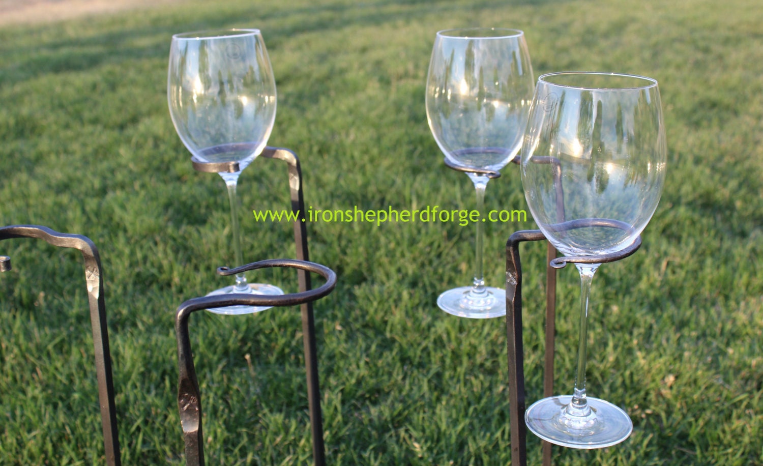 Hand wine glass stakes wine glass holders.