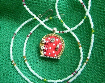 Fairy door, hobbit door pendant coral red with white polka dots on beaded necklace, wishing fairy door beaded necklace