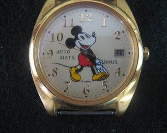 Items similar to Vintage Lorus Quartz Mickey Mouse Watch on Etsy