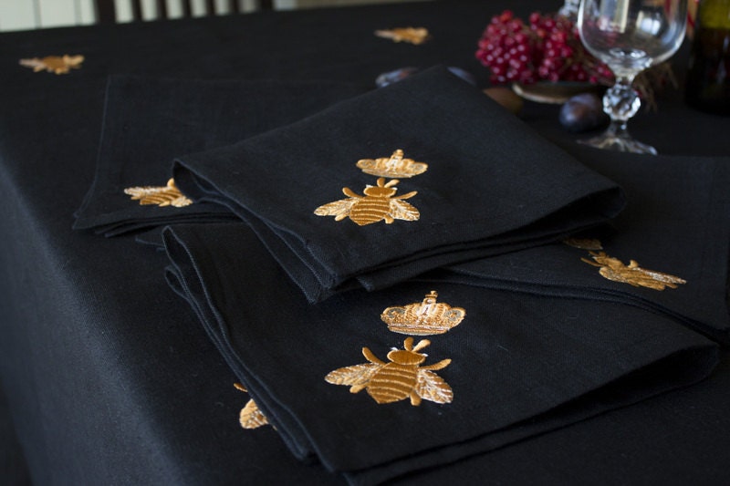 Black linen dinner napkins with gold beeembroidery