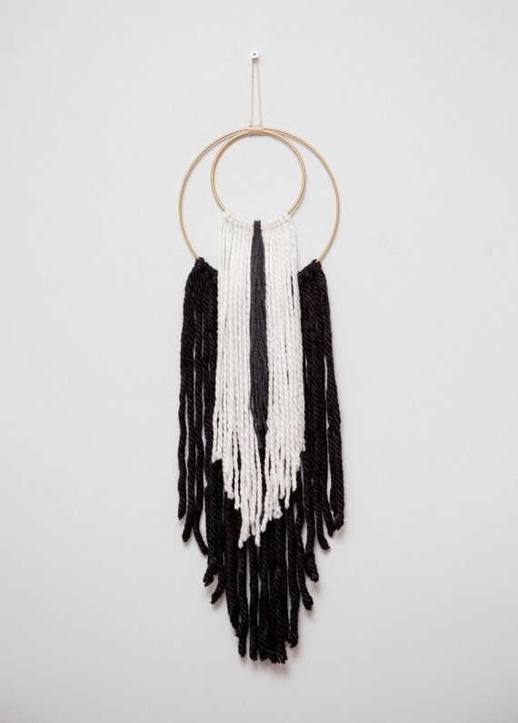 Items similar to Black and White Tassel Wall Hanging on Etsy