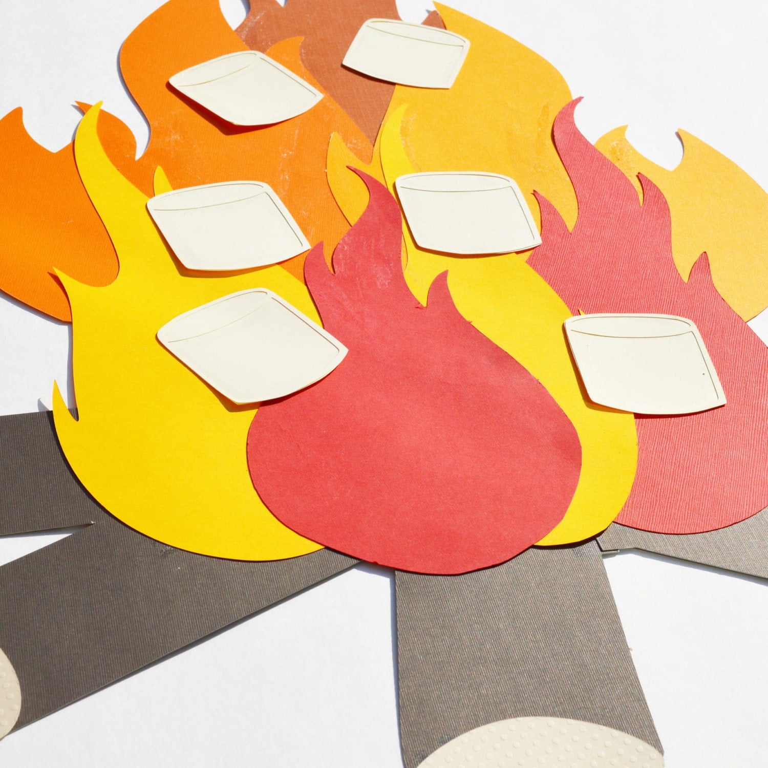 Pin the marshmallow on the campfire // woodland party game