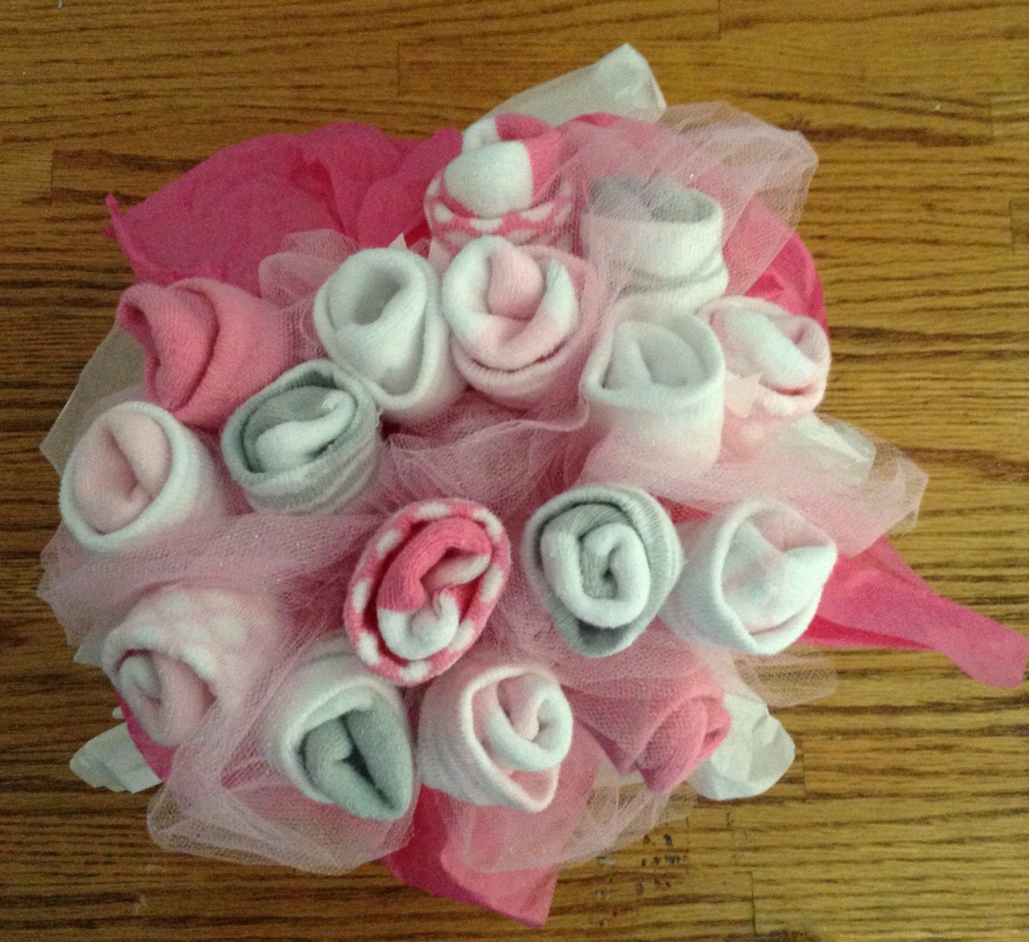 Baby sock bouquet baby shower centerpiece by BritaBabyBoutique