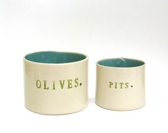 olives and pits  ...  hand built porcelain containers ...  vessels