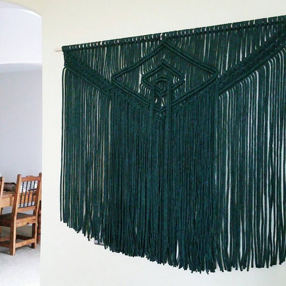 Large outdoor safe macramé wall hanging in color.