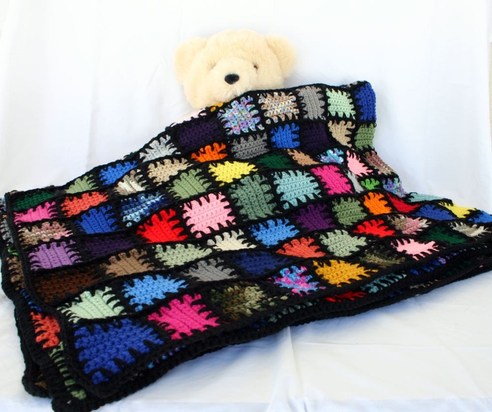 Scrap yarn afghan colorful crocheted lap throw blanket squares