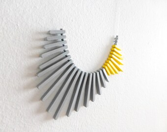 yellow grey geometric necklace, minimalist concept contemporary jewelry