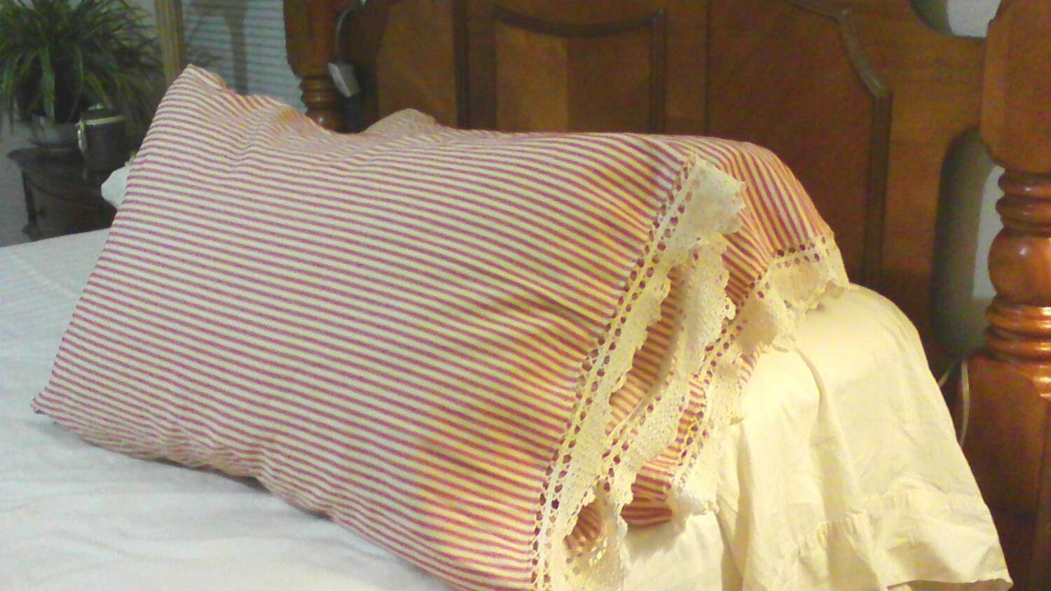 red ticking and lace pillowcases