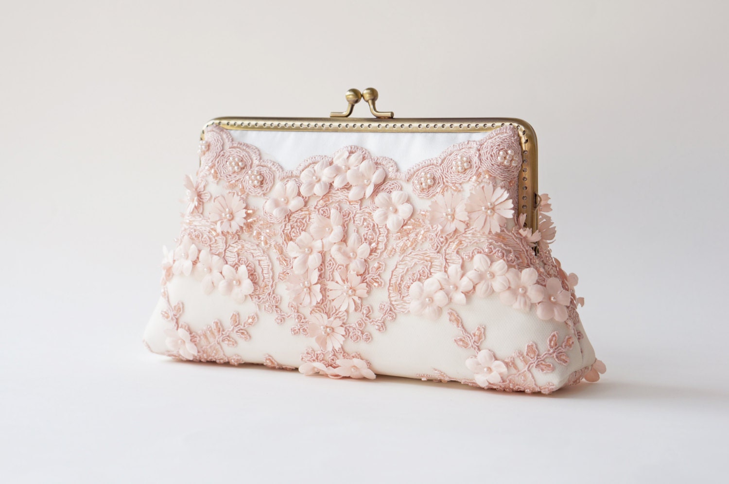 rose coloured clutch bag