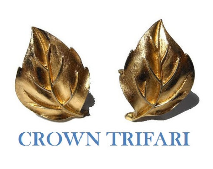 Crown Trifari earrings 1950s early 60s leaf gold clip earrings with textured sculpted veins.