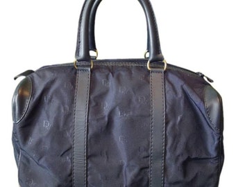 Vintage Christian Dior navy handbag purse in logo jacquard nylon and leather trimmings. Mini duffle bag. Unisex use.