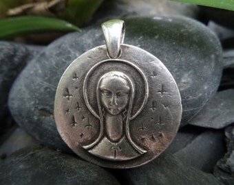 Old sterling silver Virgin Mary medal. Second hand.