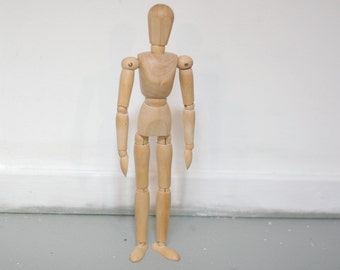 wooden drawing doll