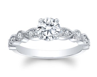 Ladies Platinum antique engagement ring with 1 carat Round Brilliant White Sapphire and 0.20 ctw diamonds