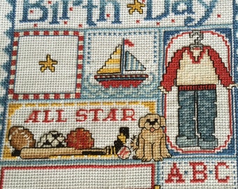 Birthday Boy completed cross stitch