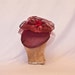 Handmade plum coloured ladies hat decorated with tulle, veiling and handmade rose