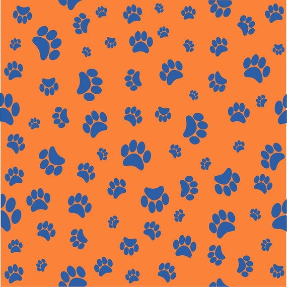 Orange with blue paw prints heat transfer or adhesive vinyl