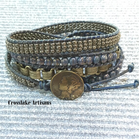 Fourwrap blue and brass bracelet with brass Liberty button
