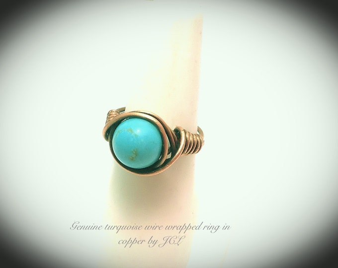Genuine turquoise wire wrapped copper ring