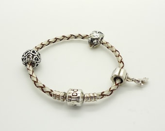 Pandora Single Woven Leather Bracelet in Champagne with Four Pandora Charms