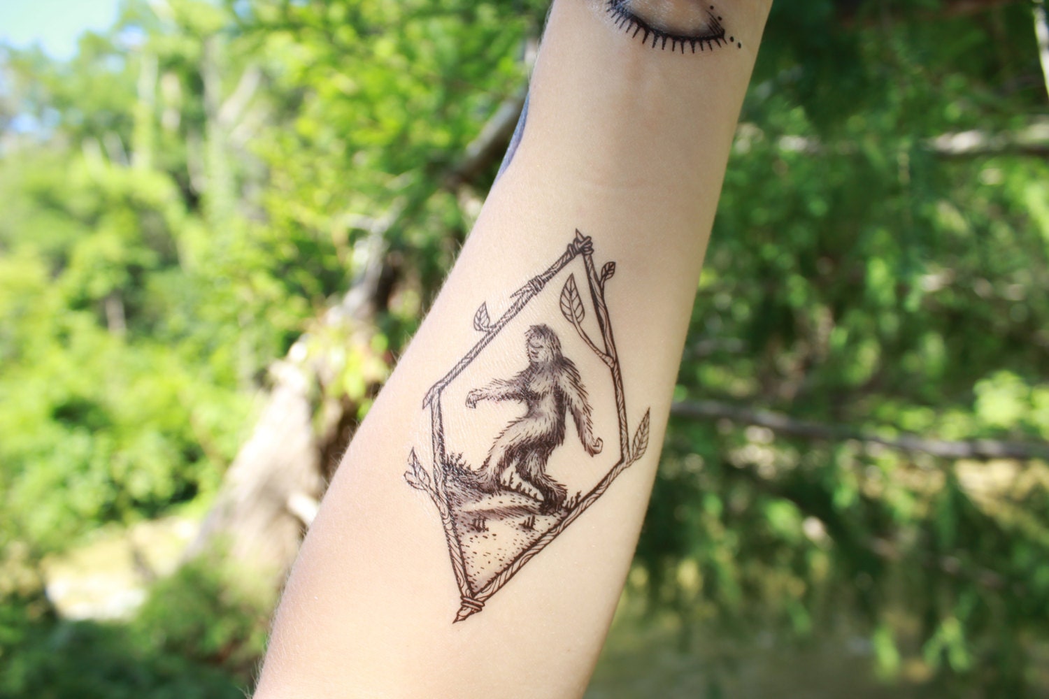 sasquatch temporary tattoo bigfoot framed in a twig sasquatch temporary tattoo bigfoot framed in a twig