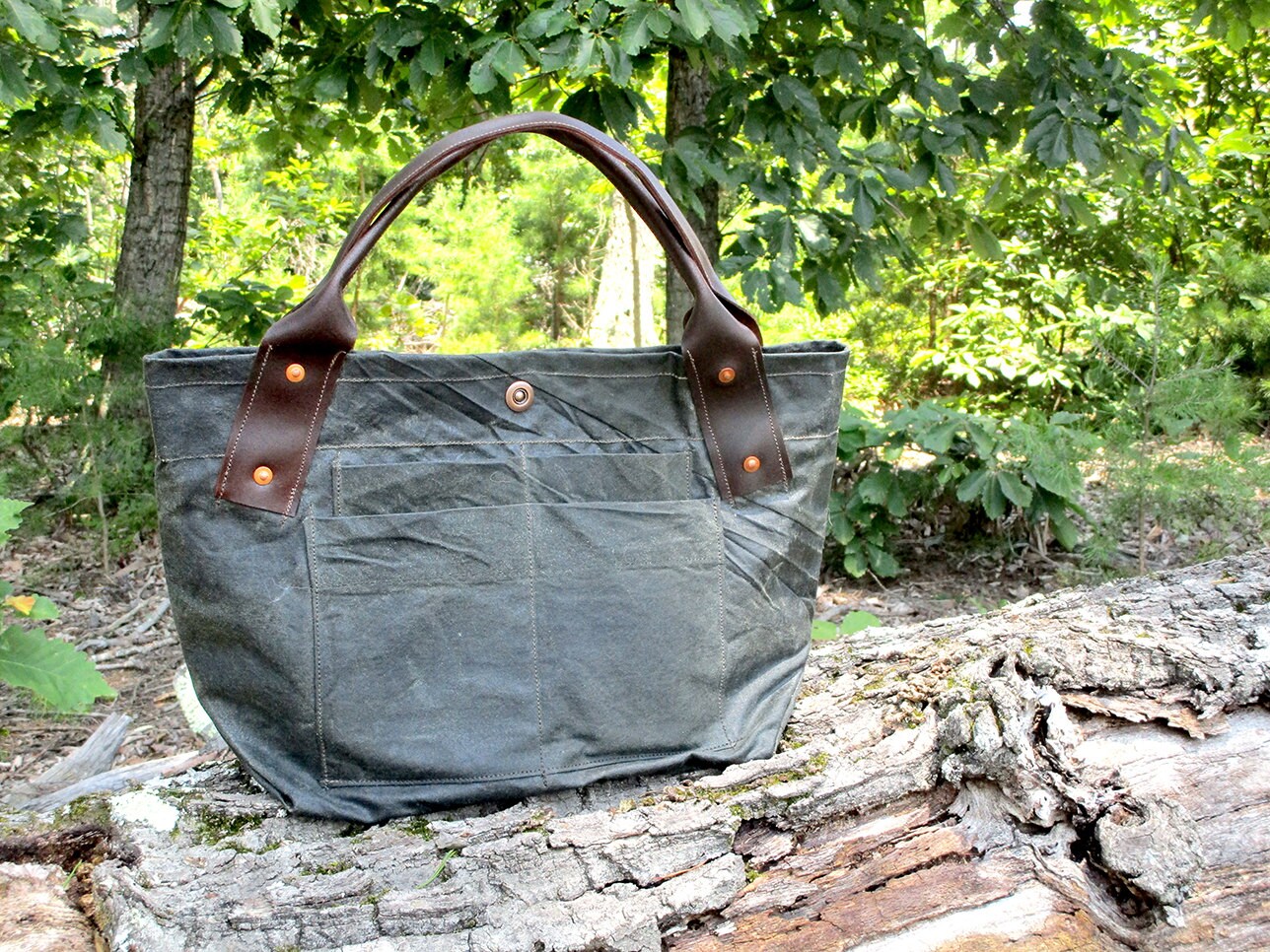 Recycled & waxed army tent canvas handbag. Leather handles and