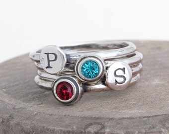 Stackable Initial Rings and Stack Birthstone Rings. Mothers Rings in a Set of 4 Stackable Rings in Silver by Nelle and Lizzy