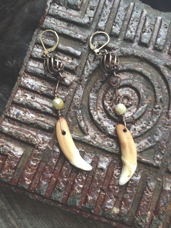 Antiqued coyote tooth earring with green czech by VirgoInspiration