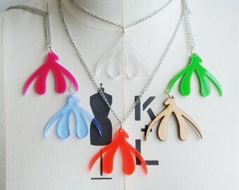 Laser Cut Clit Necklaces for FGM Charity