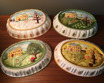 Vintage set of four hanging ceramic molds celebrating the seasons made in Japan