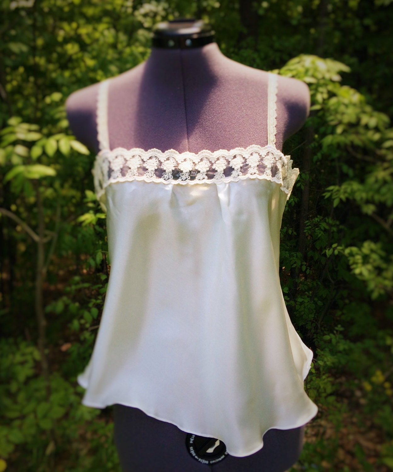 White silk satin camisole with lace trim