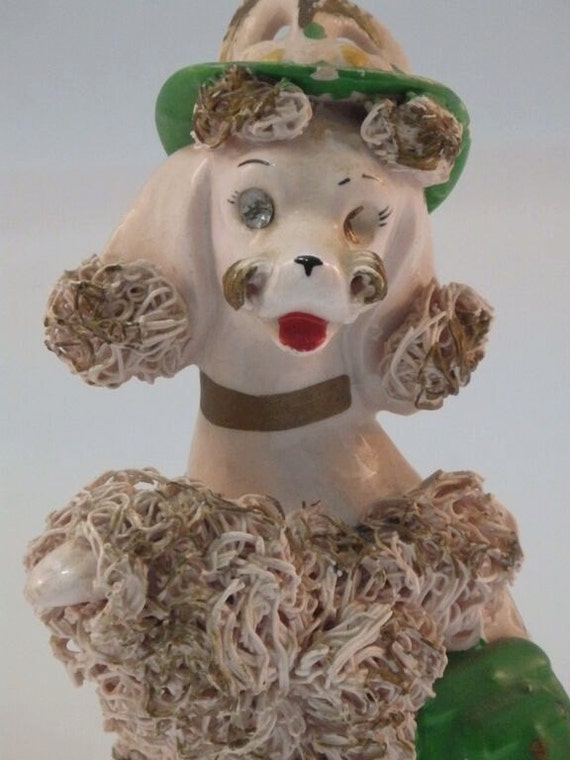pink spaghetti poodle figurine
