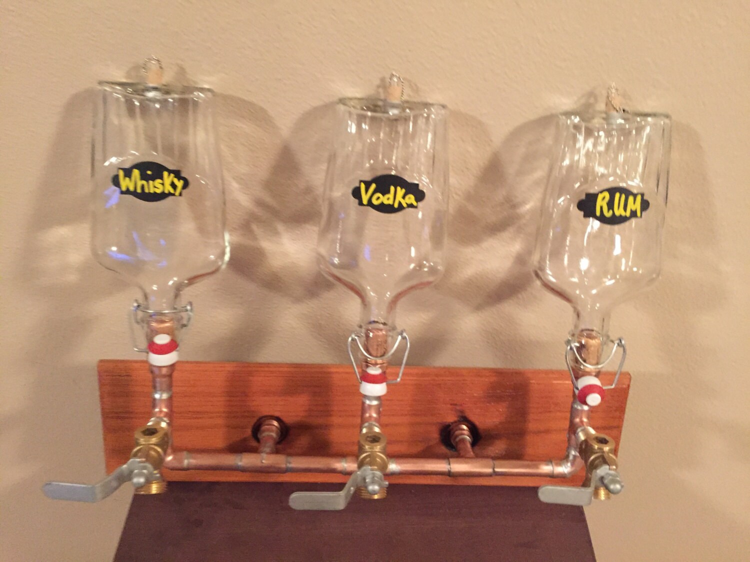 Triple Wall Mount Liquor Dispenser With by ManMadeForManCave