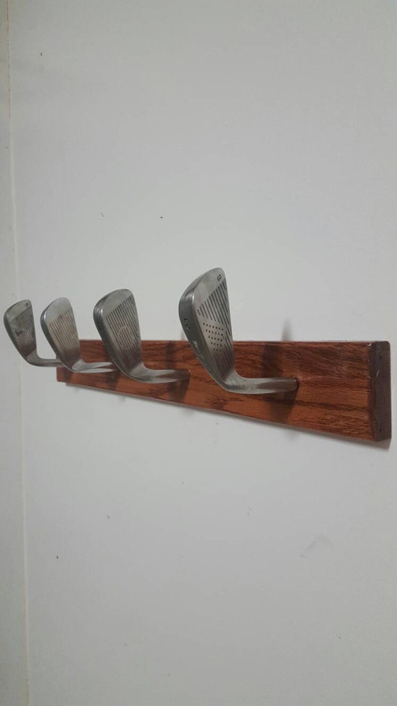 Golf club hat rack