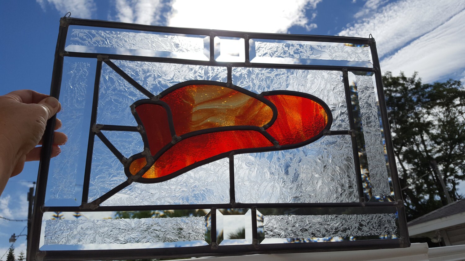 Stained glass firefighter helmet in fire glass glue chip