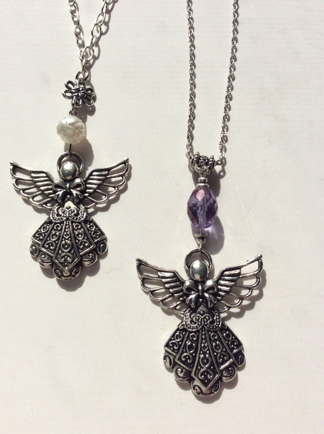 Angel pendant necklace. Antiqued silver angel