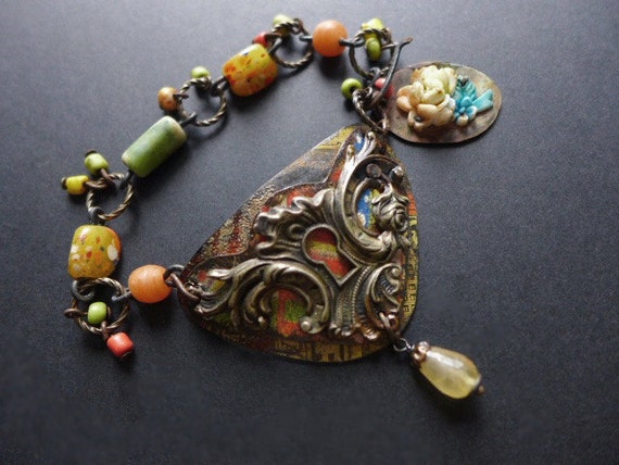 Iridian. Colorful rustic assemblage keyhole bracelet. 