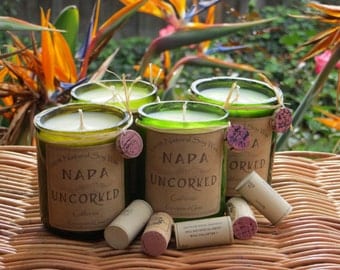 Candles made out of recycled wine bottles....Wine scented